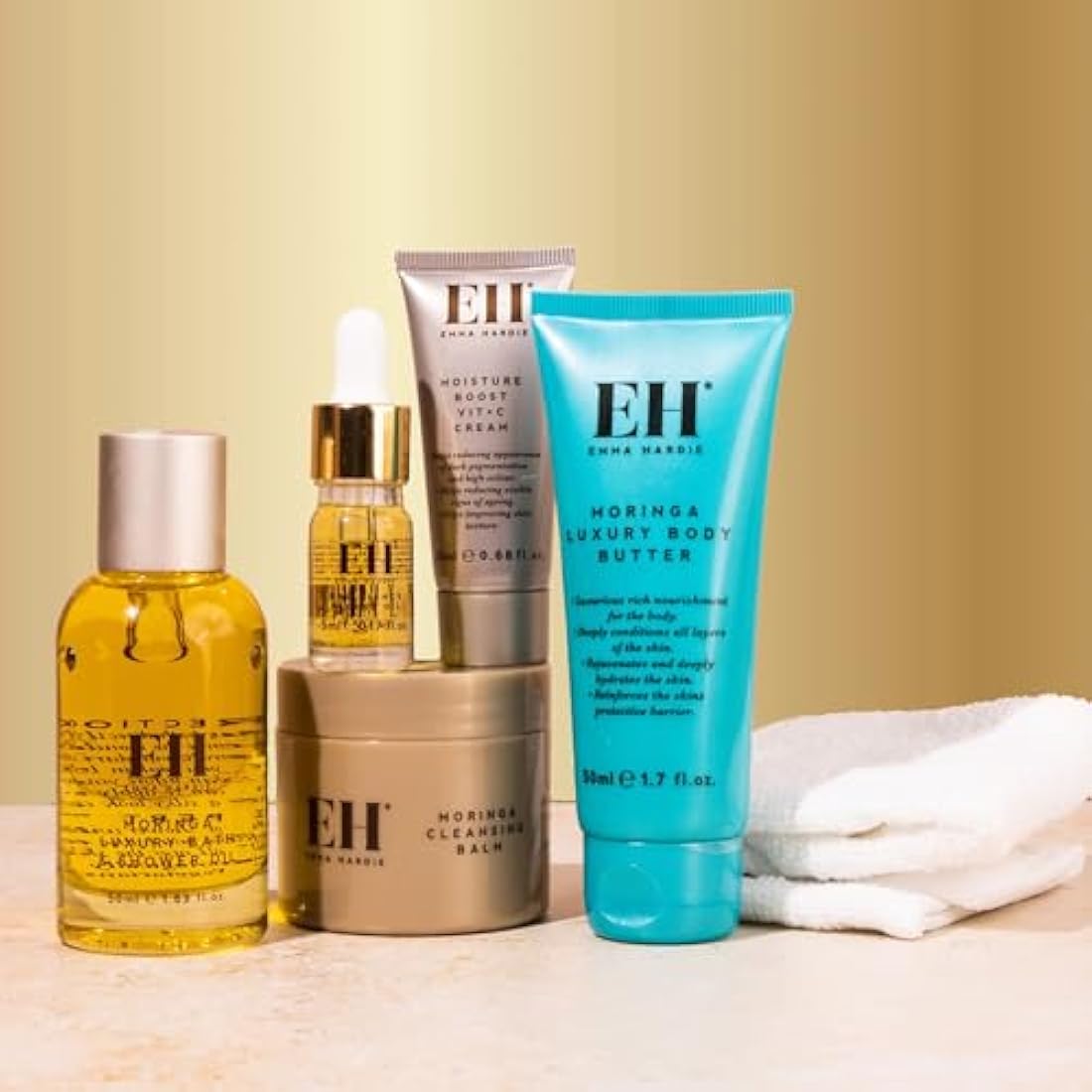 Emma Hardie 5pcs Amazing Travel Kit: 30ml Moringa Cleansing Balm, 50ml Moringa Luxury Bath & Shower oil, 50ml Moringa Luxury Body Butter, 20ml Moisture Boost Vit C Cream, 5ml Brilliance Facial Oil