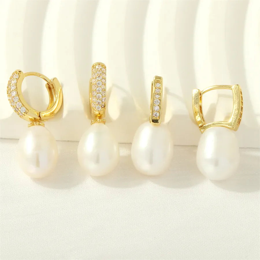 1 pair simple style irregular round plating inlay freshwater pearl copper pearl zircon 18k gold plated drop earrings