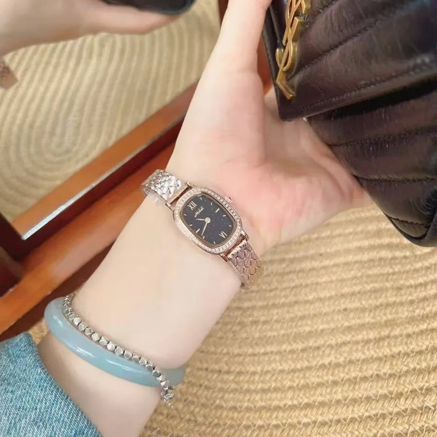 Gold Diamond Embedded Quartz Watch Elliptical Dial Starry Sky Ladies Fashionable Stainless Steel Strap Butterfly Buckle Clasp