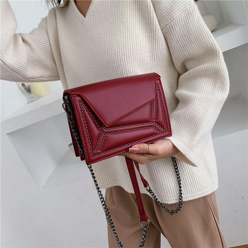 Cross-body rivet bag for lady