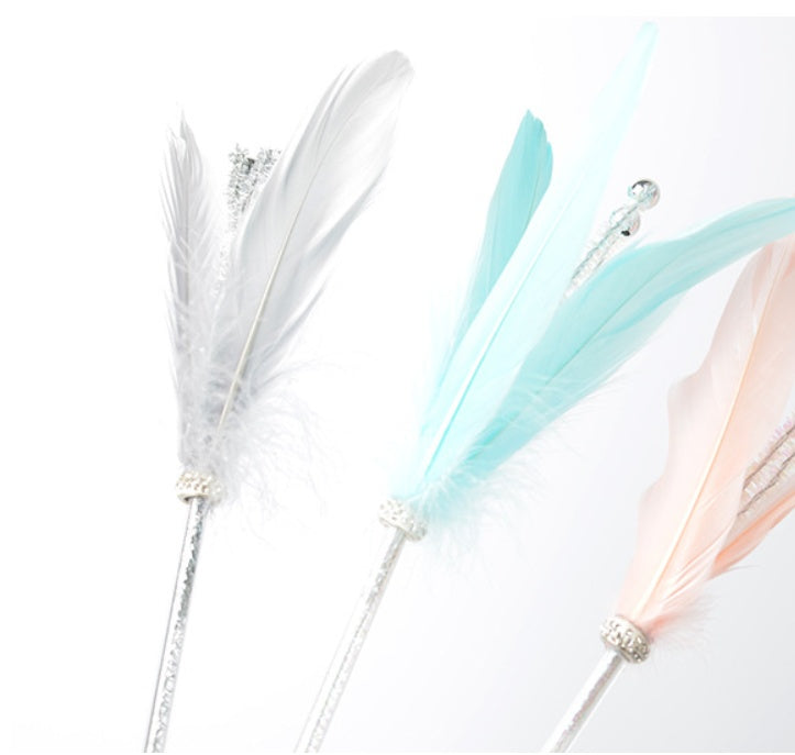 Long feather with bell