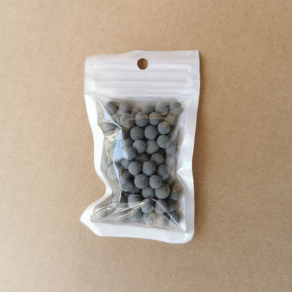 Shower filter cartridge energy ball