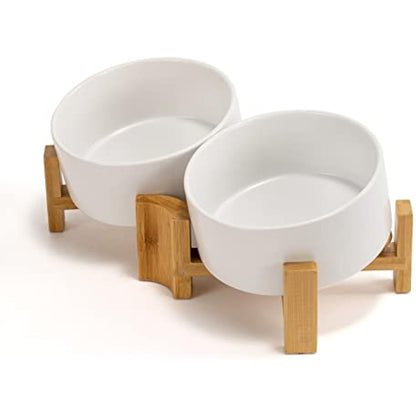 SPUNKYJUNKY 15° Slanted Ceramic Dog and Cat Bowl with Wooden Stand, Tilted Bulldog Food and Water Bowl No Slip Non-Spill for Cats Medium Dogs Flat Face Pets (850ml, White × 2)