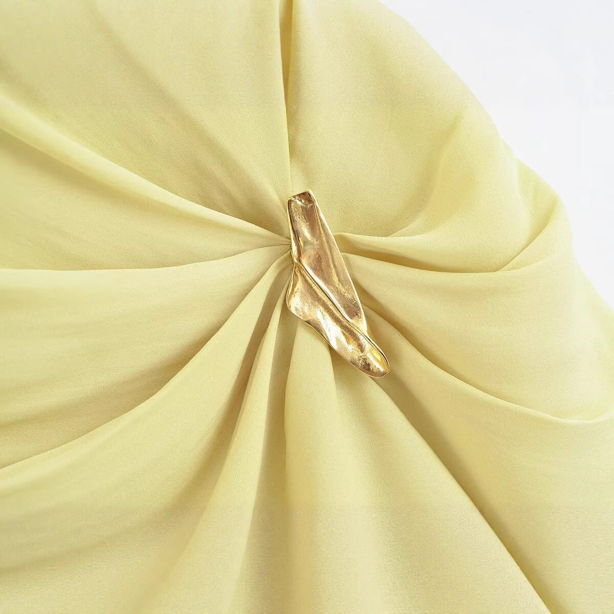 Asymmetric sleeveless pleated T-shirt top