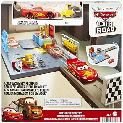 Disney and Pixar Cars On The Road Dinoco Rusteze Racing Center Playset with Lightning McQueen Toy Car, Launcher, Short Track and Spinning Pitty, Toy Gift for Kids, HGV69