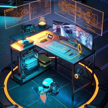 Bestier 106.5CM L-Shaped Gaming Desk with RGB LED Lights Carbon Fibre Surface, 3 Power Outlets & 2 USB Ports, Reversible Corner Desk with Shelves & Hooks for Home Office & Small Spaces