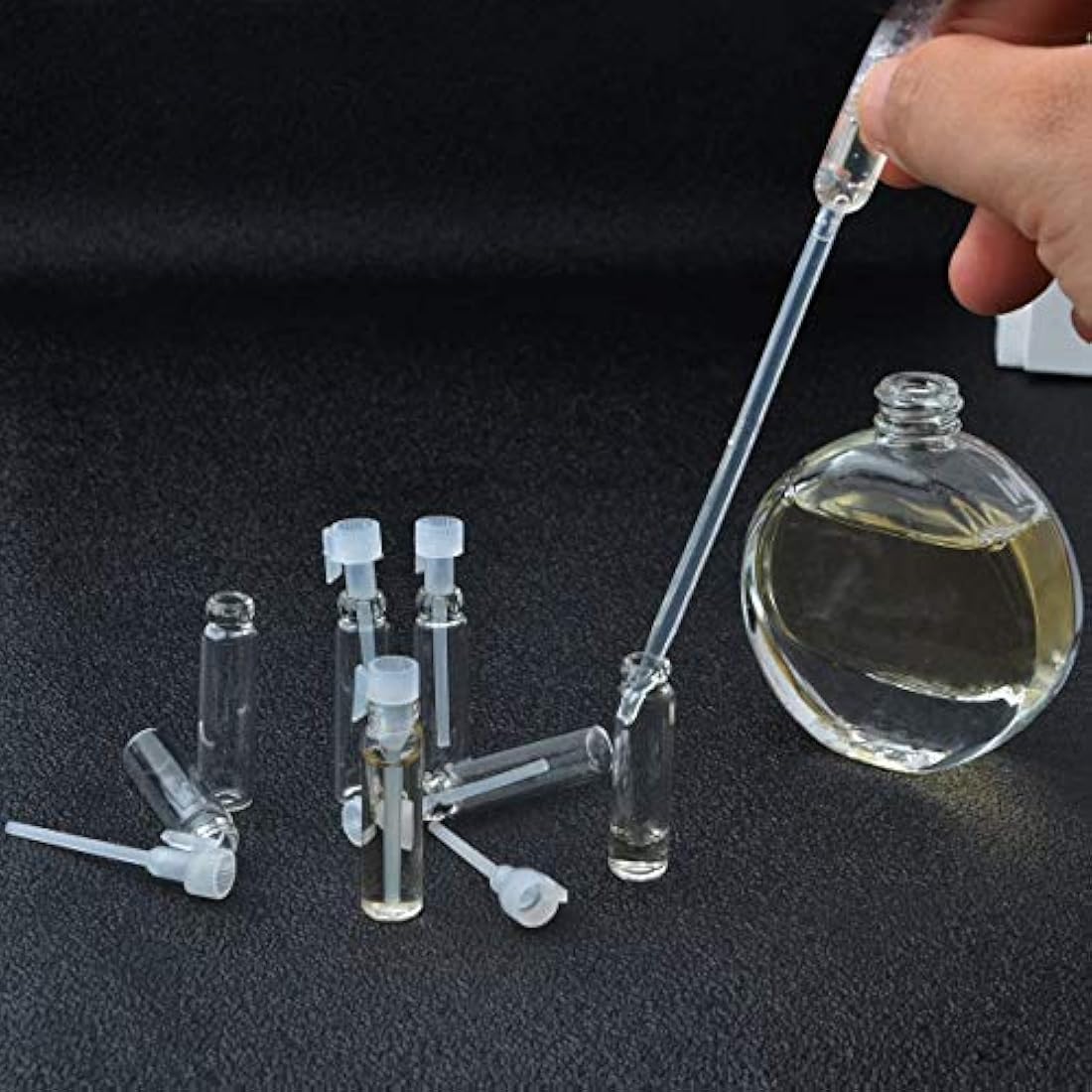 Enslz 100Pcs Mini Sample Cute Glass Travel Oil Perfume Bottle with Drop& Vials Empty Sample Bottle for Essential Oils Aromatherapy… (1ml)