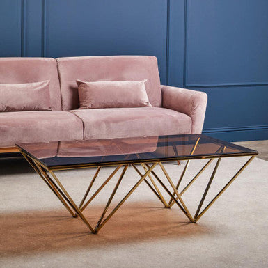 Red-Tinted Tempered Glass Top Coffee Table with Geometric Prismatic Champagne Metal Legs | Allure