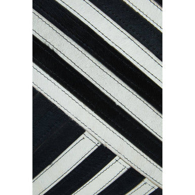 Bosie Safira Black and White Hair on Leather Cushion