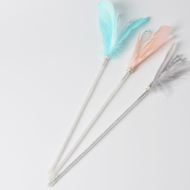 Long feather with bell