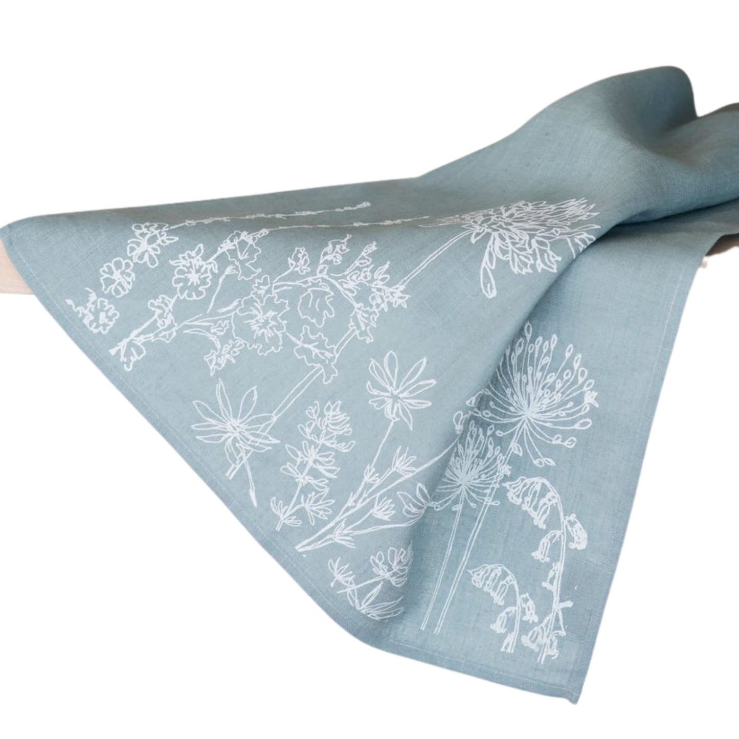 Helen Round Linen Tea Towel, duck egg blue. This beautiful, hand printed towel features garden flowers. Machine Washable at 40 degrees and will