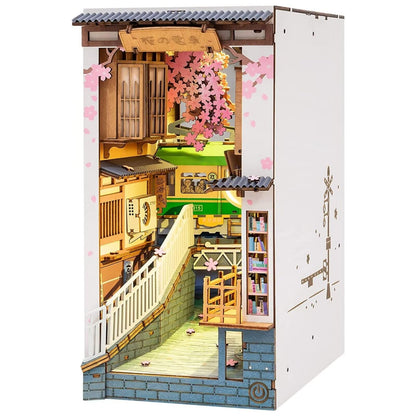 Rolife Sakura Densya Book Nook Kits for Adults DIY Miniature Kit with Light for Desk Library Bookshelf Decoration 3D Wooden Puzzle Booknook Model Kits