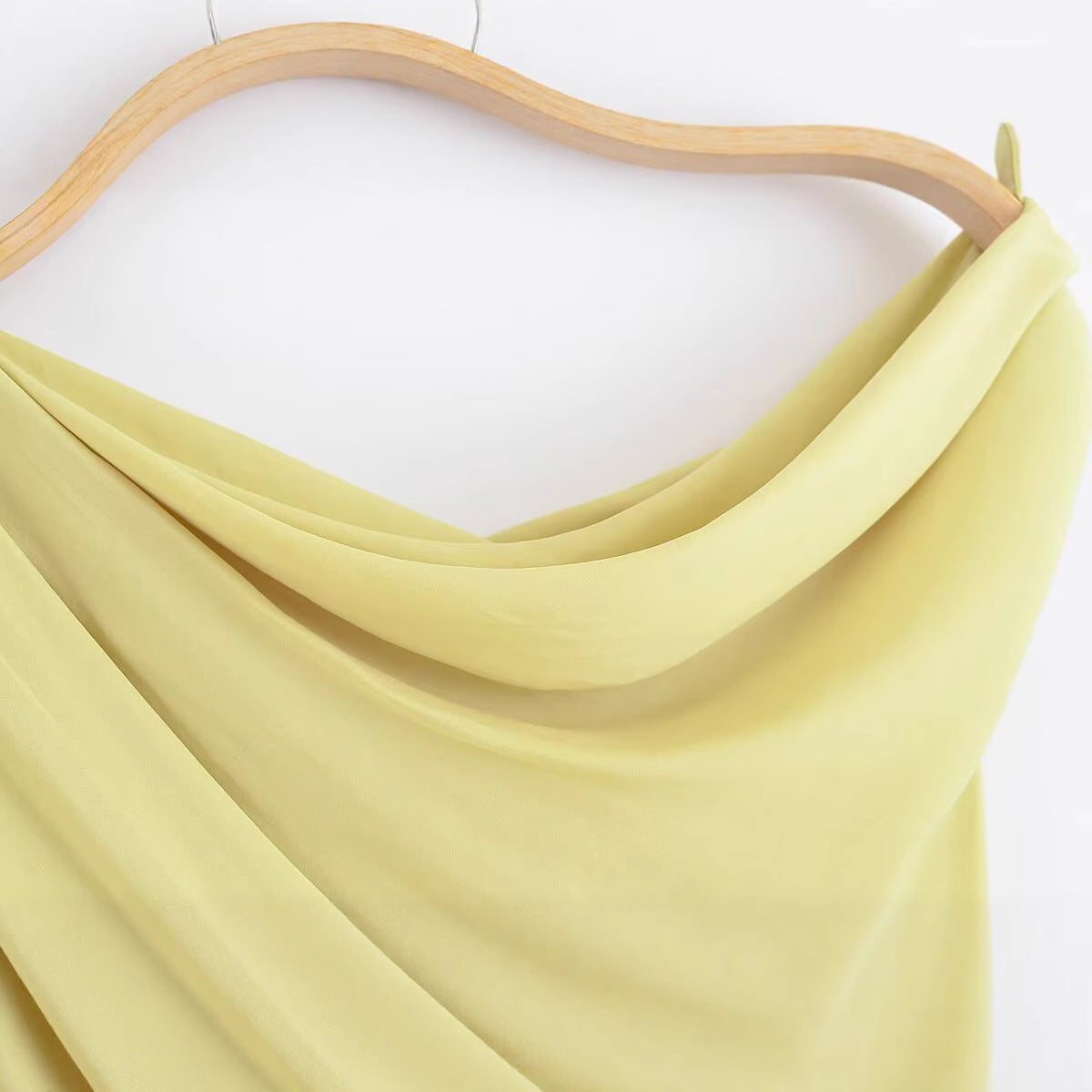 Asymmetric sleeveless pleated T-shirt top