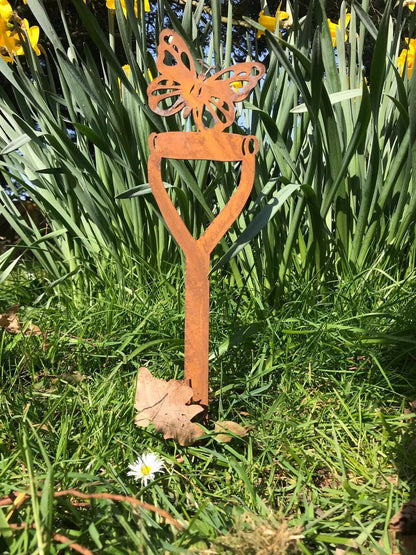 Rusty Metal Butterfly On A Spade Garden Decoration