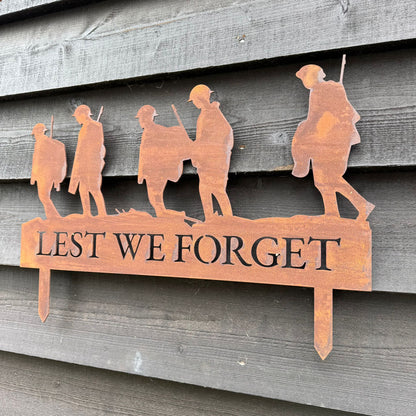 A Rusty Metal Lest We Forget Soldier Scene Garden Decoration