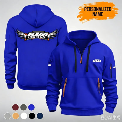 The KTM “Ready to Race” printed half-zip hoodie features workwear pockets and arm pockets, perfect for motorcycle enthusiasts.