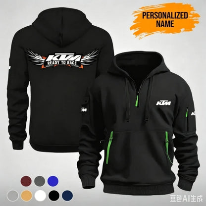 The KTM “Ready to Race” printed half-zip hoodie features workwear pockets and arm pockets, perfect for motorcycle enthusiasts.