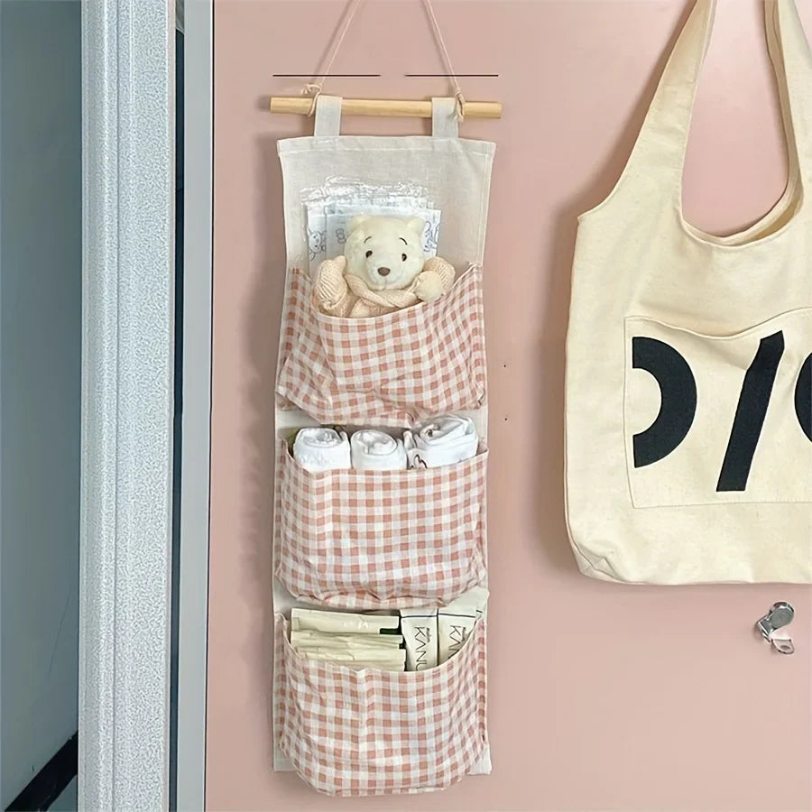 Pink Storage Bag Rack Canvas Wall Mounted Bedroom Storage Bag Multifunctional for Books, Jewelry, and Miscellaneous Items,
