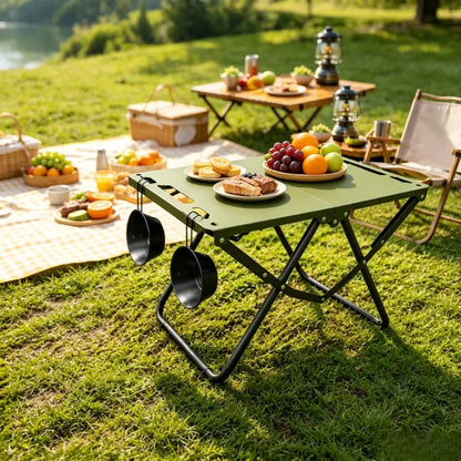 Green Portable Foldable Camping Table, Hollow Edge Hangable Design, Lightweight Durable Table for Picnic Beach Outdoor Travel