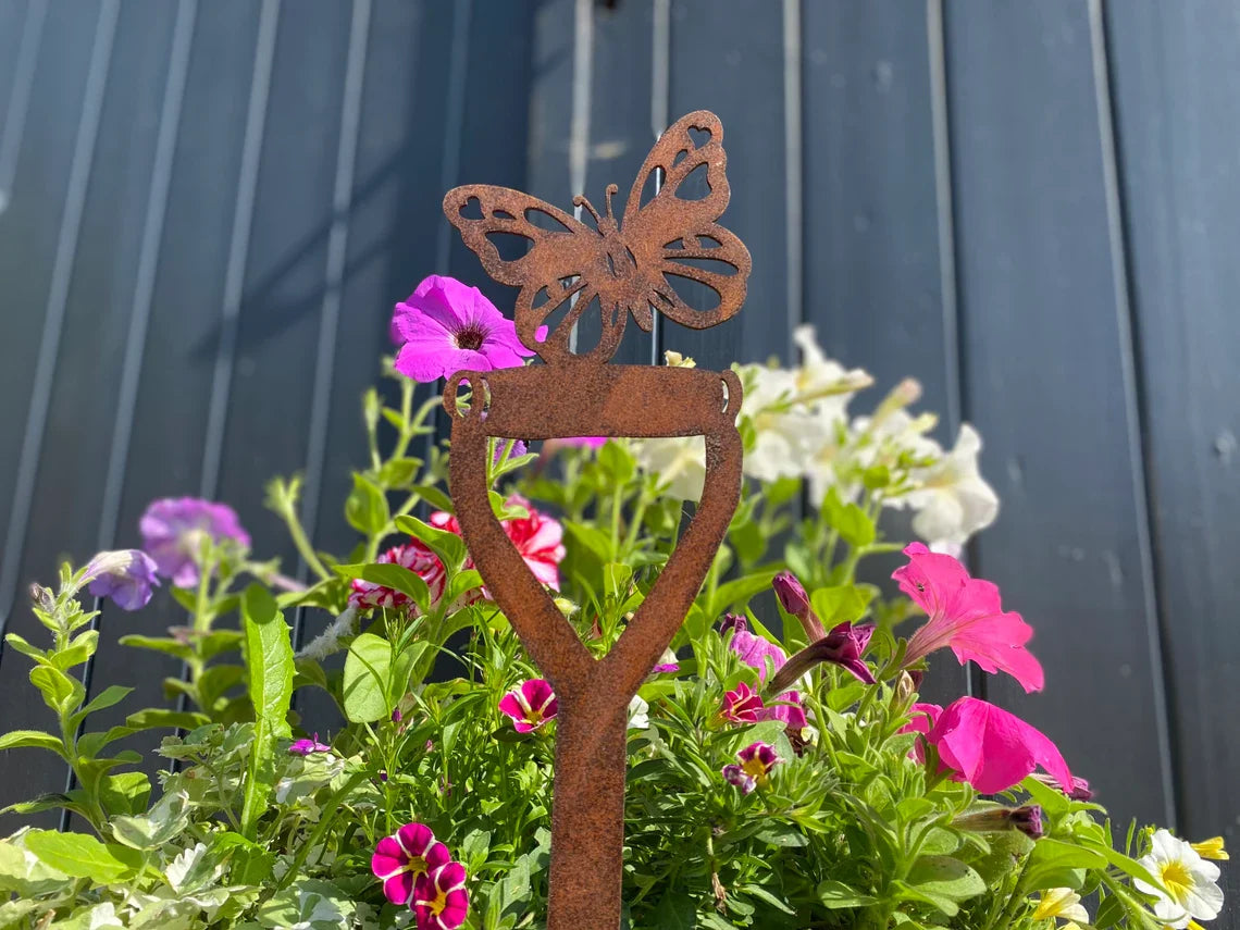 Rusty Metal Butterfly On A Spade Garden Decoration