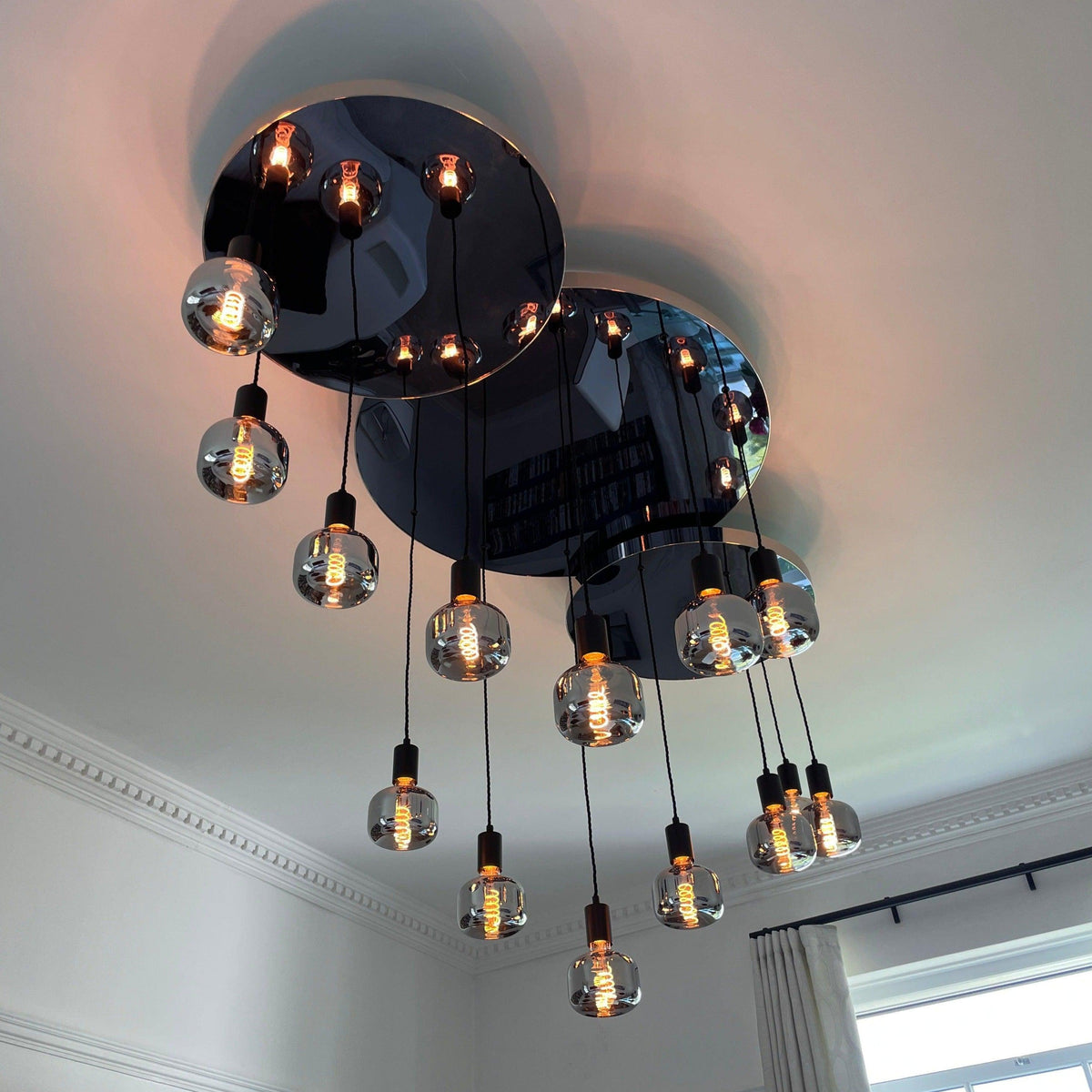 Modern Waves: Stainless Steel Mirrored Chandelier