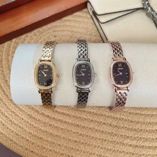 Gold Diamond Embedded Quartz Watch Elliptical Dial Starry Sky Ladies Fashionable Stainless Steel Strap Butterfly Buckle Clasp